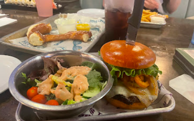 The Grumpy Monk signature dishes Famous Monk Wings
Big Kid Chicken Fingers
The Red White & Blue Burger